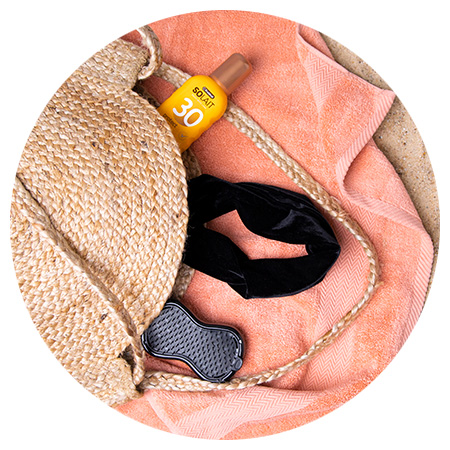 Sfeerbeeld - 9 dingen die niet mogen ontbreken in je strandtas