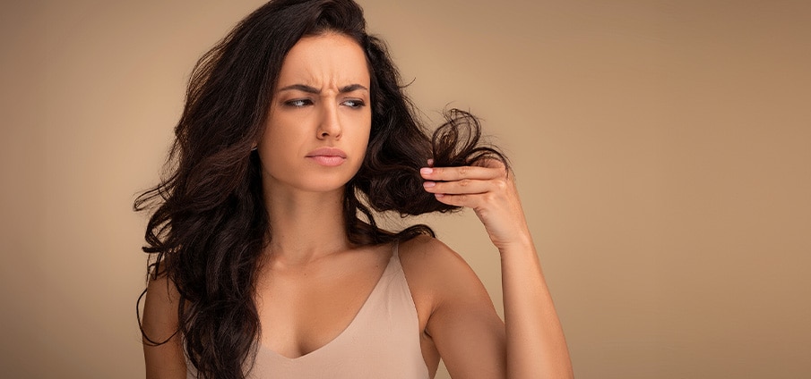 Haarolie voor droog haar: dit doet het en zo kies je de juiste Haarolie voor droog haar: dit doet het en zo kies je de juiste
