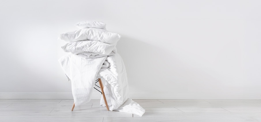 Dekbed wassen: aantal graden, welk programma en meer